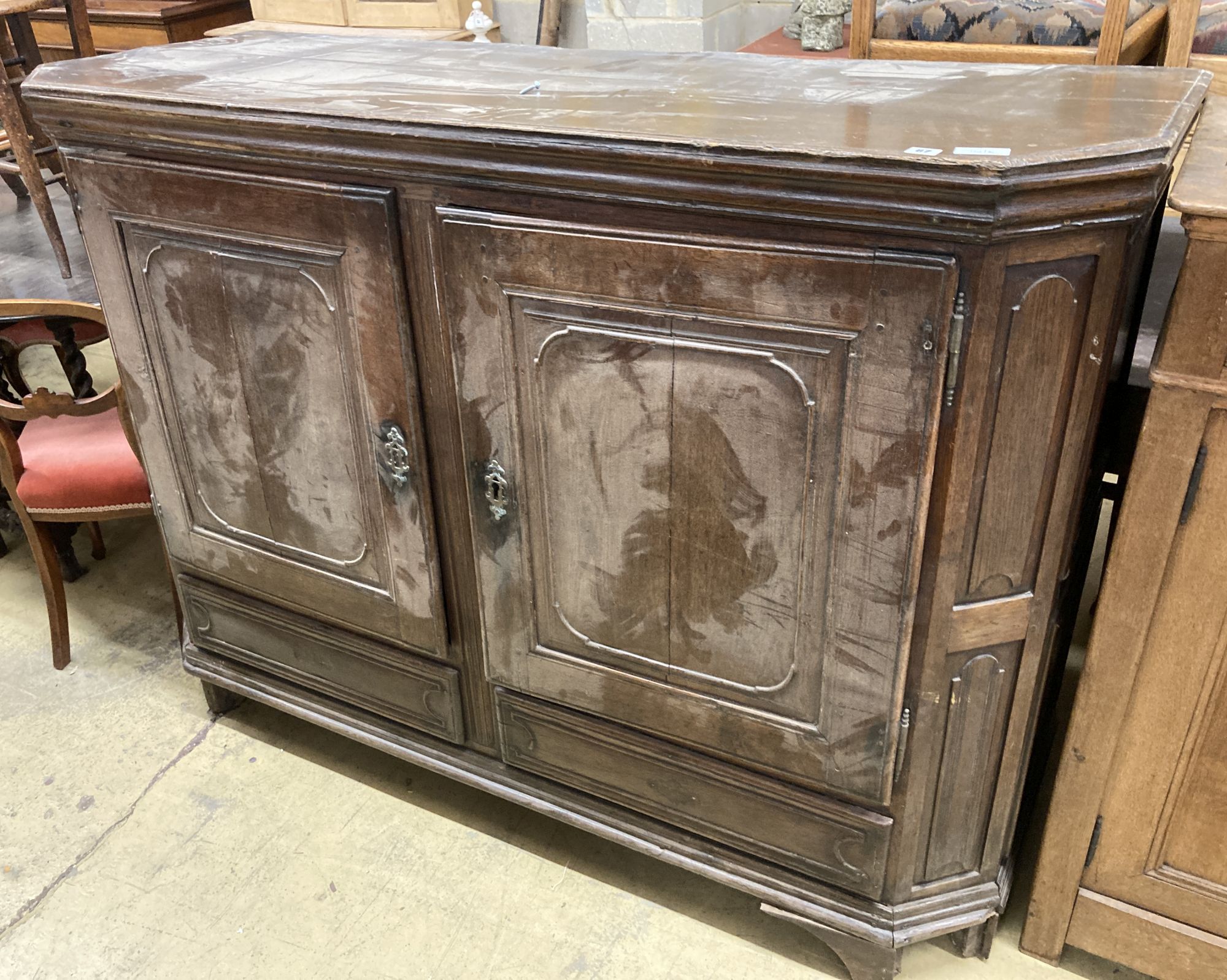 A Dutch oak two door cabinet, width 170cm, depth 60cm, height 124cm